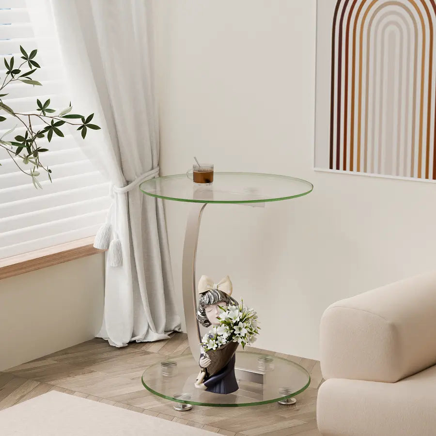 Table daccent Optimum Plus en verre et acier inoxydable, élégante, avec un vase de fleurs sur son plateau.