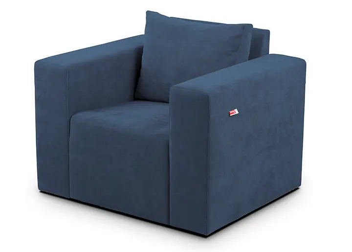 Fauteuil Teodor de couleur bleu foncé, en tissu doux, au design moderne et épuré, offrant confort et style. Optimum Plus.