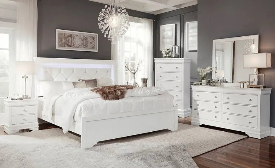 Chambre moderne avec un lit Pompei blanc, meuble en bois, style élégant, accompagné dune commode et de tables de nuit.